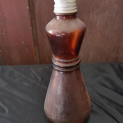 Seven Old glass bottles and jars