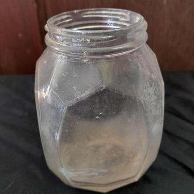 Seven Old glass bottles and jars