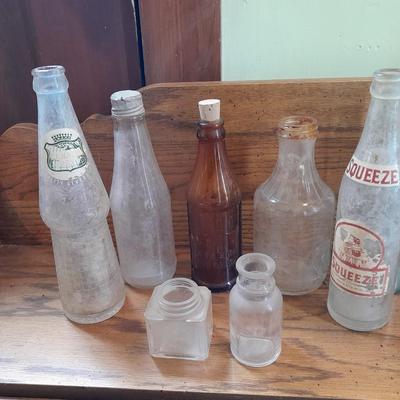 Eight Old glass bottles Squeeze drink, Canada Dry and more