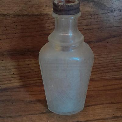Seven Clear old glass bottles Squire Scuff Kote and others