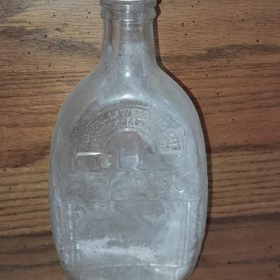 Seven Clear old glass bottles Squire Scuff Kote and others