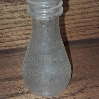 Seven Clear old glass bottles Squire Scuff Kote and others