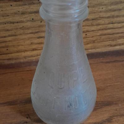 Seven Clear old glass bottles Squire Scuff Kote and others