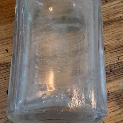 Seven Clear old glass bottles Squire Scuff Kote and others
