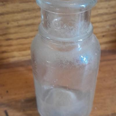 Seven Clear old glass bottles Squire Scuff Kote and others