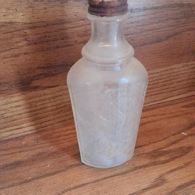Seven Clear old glass bottles Squire Scuff Kote and others
