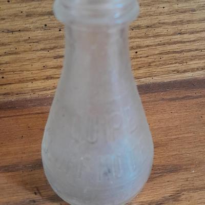 Seven Clear old glass bottles Squire Scuff Kote and others