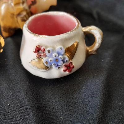 Small China collectables and small tin platter