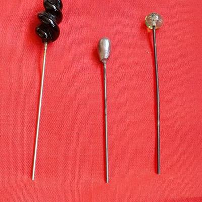 Three vintage hat pins