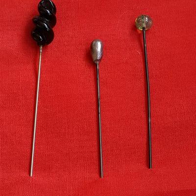 Three vintage hat pins