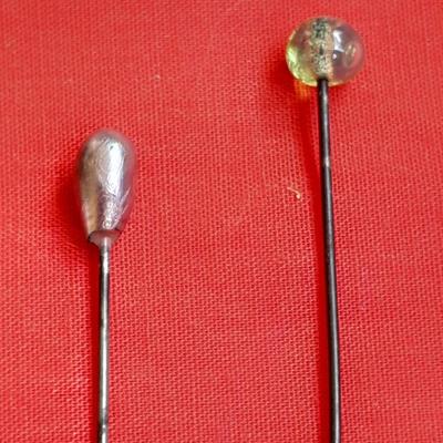 Three vintage hat pins