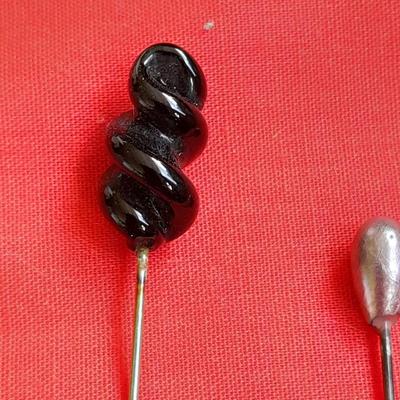 Three vintage hat pins