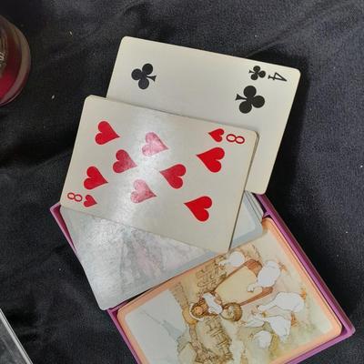 Variety of home decorative items bridge playing cards, candle, Love plate, tin and more