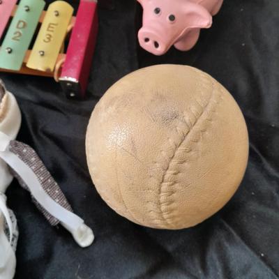 Vintage 10 Key Xylophone with stick, porcelain doll, softball, and Oscar Mayer piggy