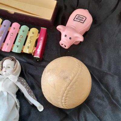 Vintage 10 Key Xylophone with stick, porcelain doll, softball, and Oscar Mayer piggy