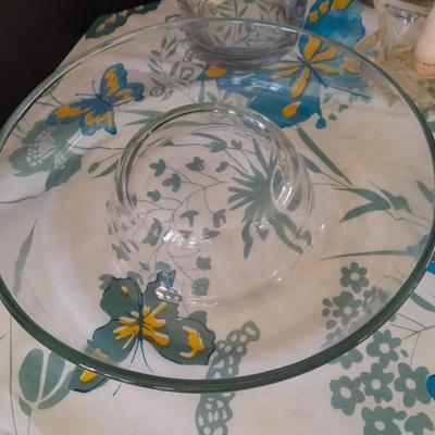 Assorted candles and holders including vintage wooden spool