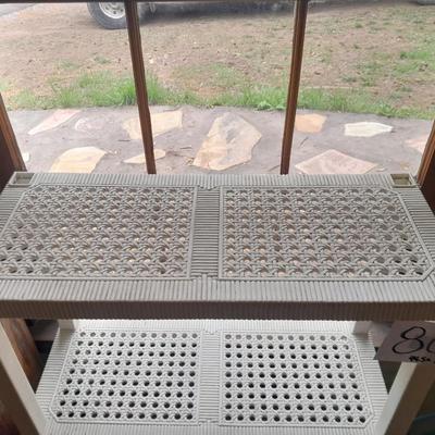 Plastic storage shelving with Vintage iron framed chair