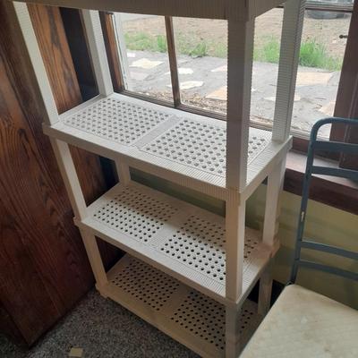 Plastic storage shelving with Vintage iron framed chair