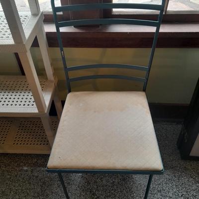 Plastic storage shelving with Vintage iron framed chair