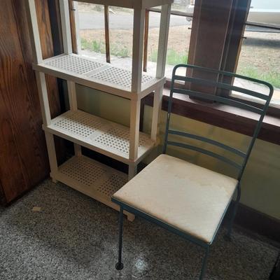 Plastic storage shelving with Vintage iron framed chair