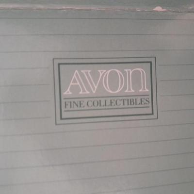 New in the box Avon Collectables, fish wind chime, Cat themed serving pieces, plate, and Wax candle maker