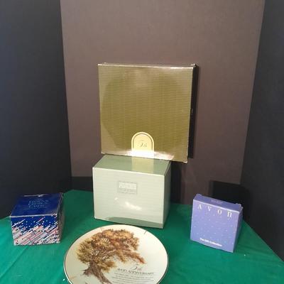 New in the box Avon Collectables, fish wind chime, Cat themed serving pieces, plate, and Wax candle maker