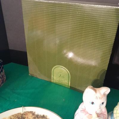 New in the box Avon Collectables, fish wind chime, Cat themed serving pieces, plate, and Wax candle maker