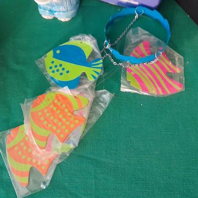New in the box Avon Collectables, fish wind chime, Cat themed serving pieces, plate, and Wax candle maker