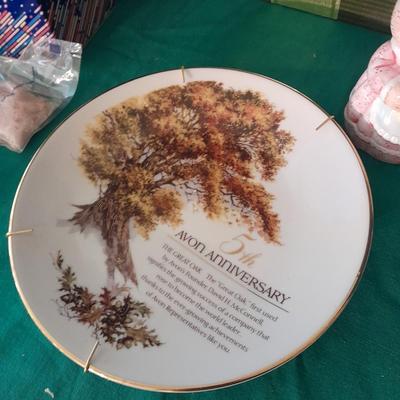 New in the box Avon Collectables, fish wind chime, Cat themed serving pieces, plate, and Wax candle maker