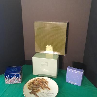 New in the box Avon Collectables, fish wind chime, Cat themed serving pieces, plate, and Wax candle maker