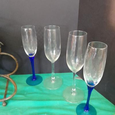 Tabletop Iron wine rack with Wine glasses and empty bottle