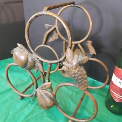 Tabletop Iron wine rack with Wine glasses and empty bottle