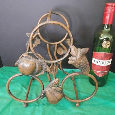 Tabletop Iron wine rack with Wine glasses and empty bottle