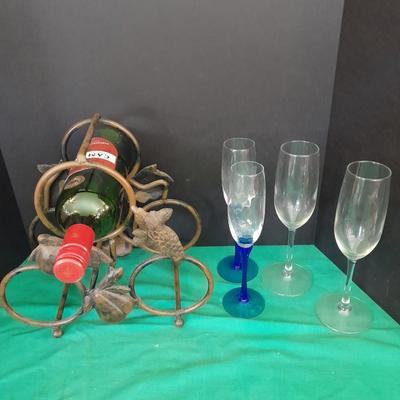 Tabletop Iron wine rack with Wine glasses and empty bottle