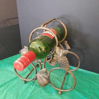 Tabletop Iron wine rack with Wine glasses and empty bottle