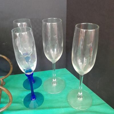 Tabletop Iron wine rack with Wine glasses and empty bottle