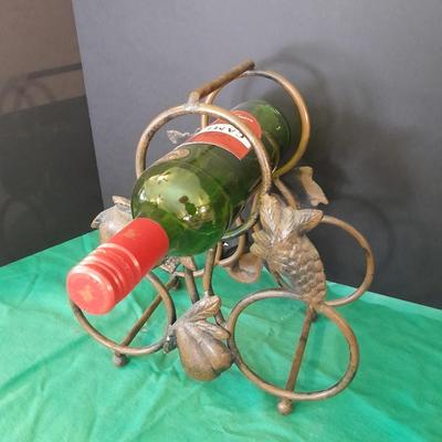 Tabletop Iron wine rack with Wine glasses and empty bottle