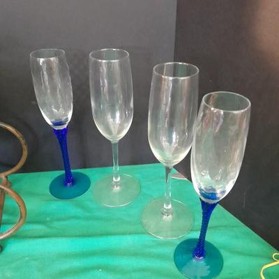 Tabletop Iron wine rack with Wine glasses and empty bottle