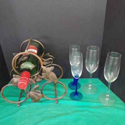 Tabletop Iron wine rack with Wine glasses and empty bottle