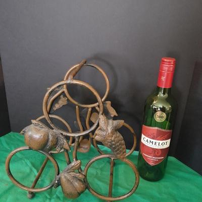 Tabletop Iron wine rack with Wine glasses and empty bottle