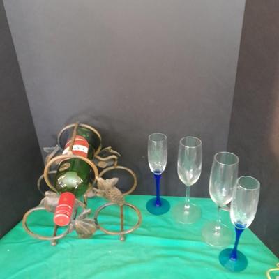 Tabletop Iron wine rack with Wine glasses and empty bottle