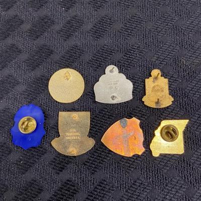 A lot of seven various military pins