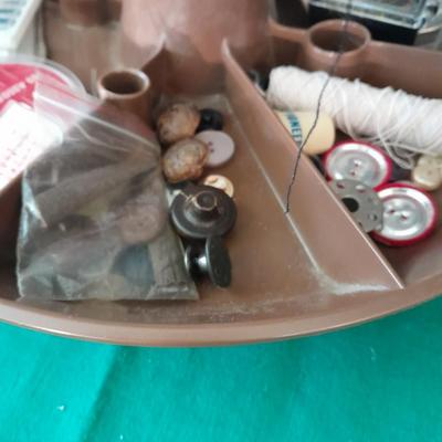 Swiveling Sewing Caddy full of sewing notions