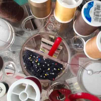 Swiveling Sewing Caddy full of sewing notions