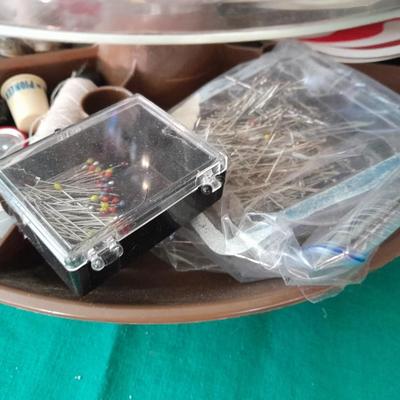 Swiveling Sewing Caddy full of sewing notions