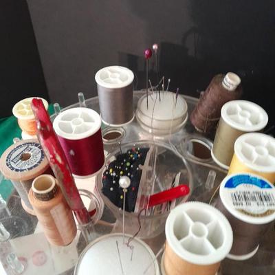 Swiveling Sewing Caddy full of sewing notions