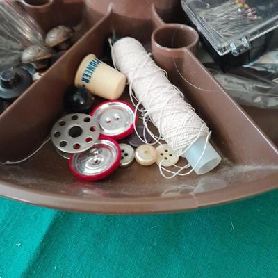 Swiveling Sewing Caddy full of sewing notions