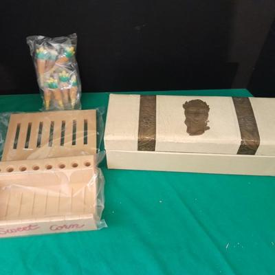Unique sweet corn cob butter and holders and a Vintage roll of soft tissue