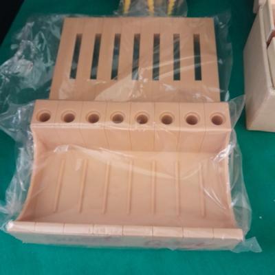 Unique sweet corn cob butter and holders and a Vintage roll of soft tissue