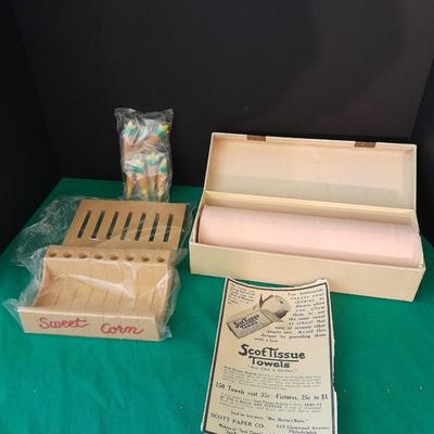 Unique sweet corn cob butter and holders and a Vintage roll of soft tissue